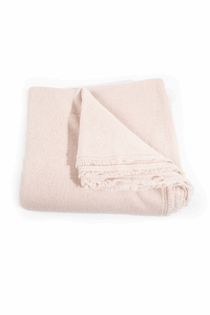 10 Best Travel Blankets for Comfort & Easy Portability 5 Naked Cashmere 4-piece Travel Set at Nakedcashmere.com